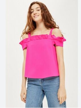 TOPSHOP hot pink cold-shoulder top with ruffle detail.